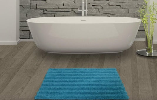 How often should you wash your bathroom rugs?